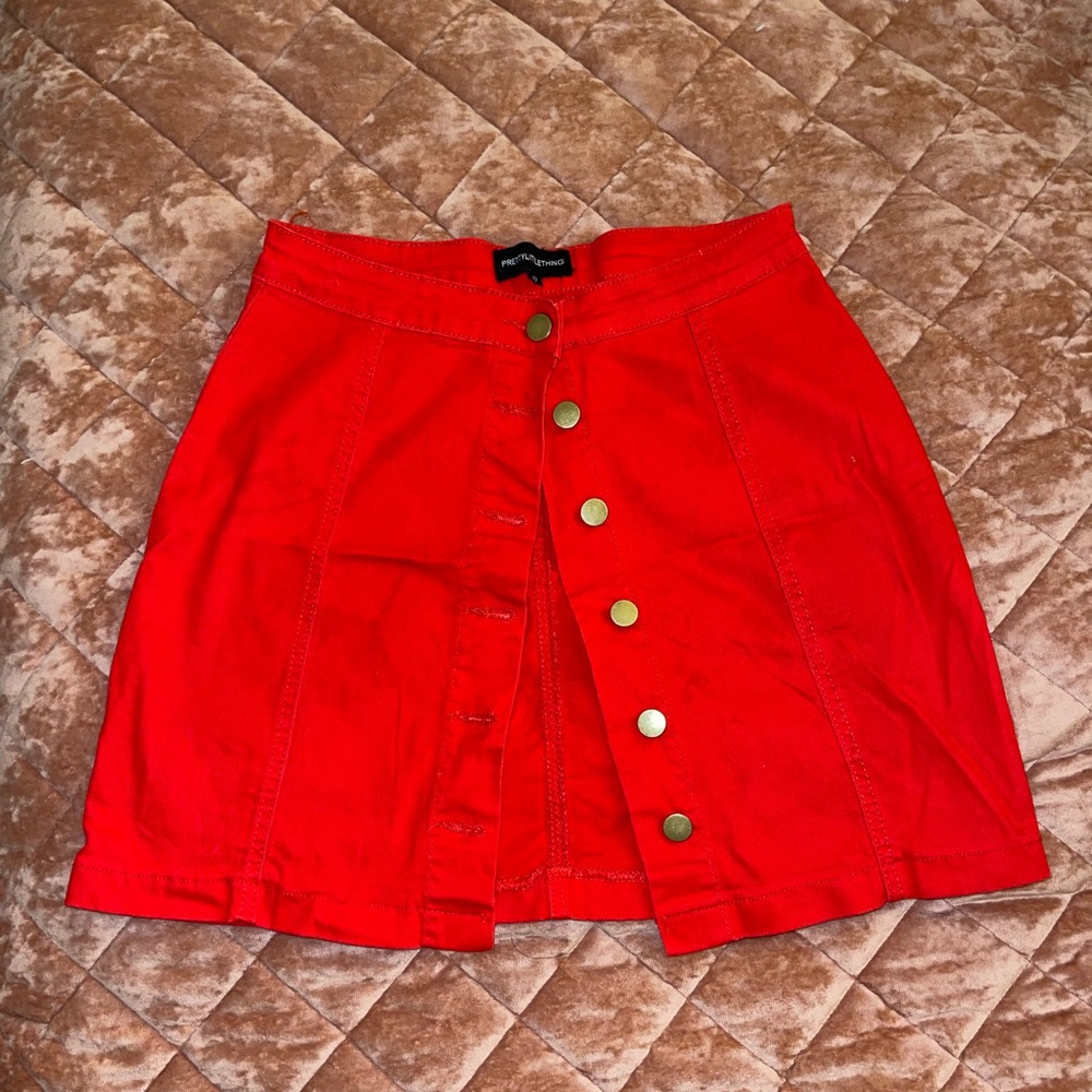 Red button up skirt! Gently worn